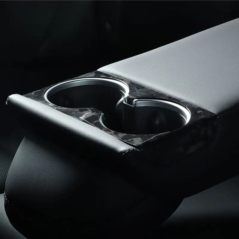 Premium dry carbon fiber beverage holder designed exclusively for Tesla Model 3 Highland and Model Y Juniper