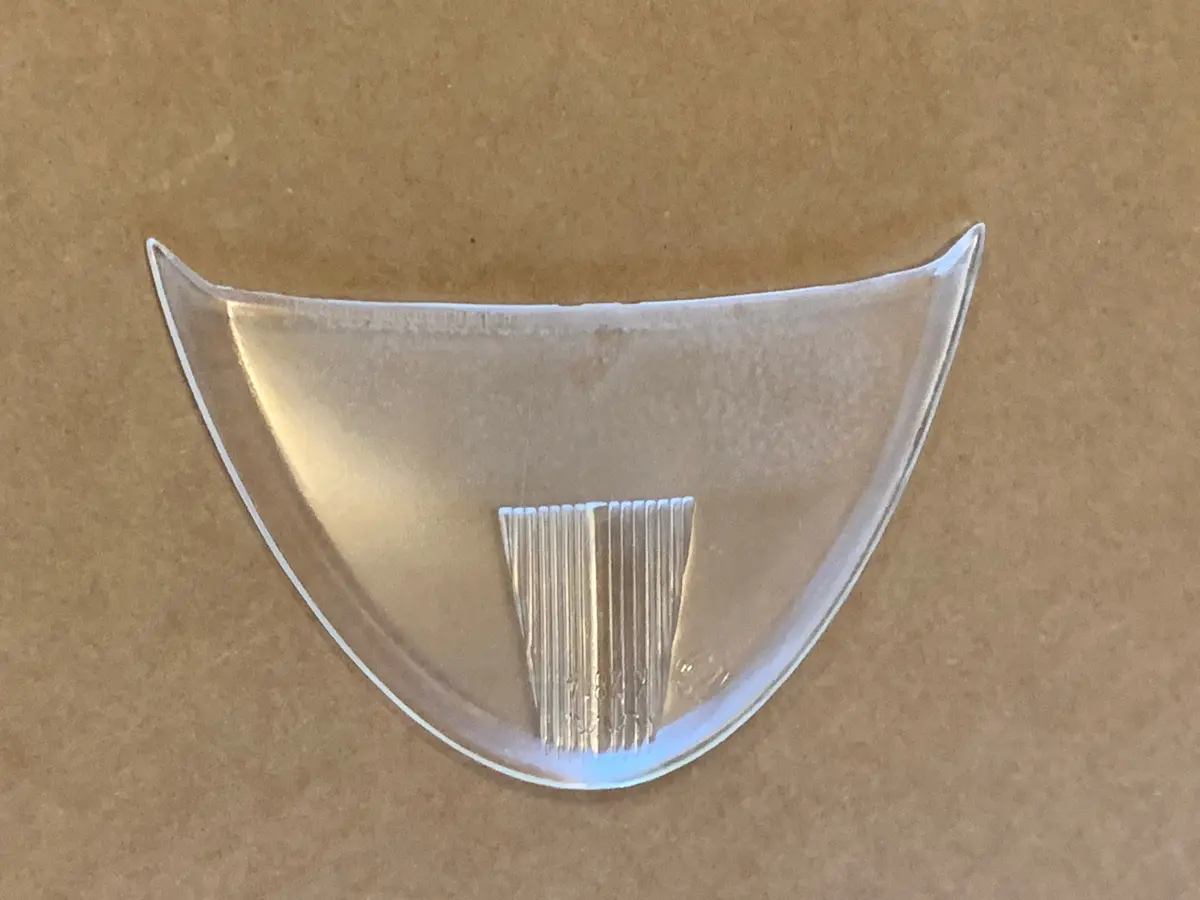 Authentic replacement lens for the rear number plate light on Volkswagen Beetles manufactured from 1952 to 1957